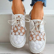 Blumige Sneaker mit Blumenmuster